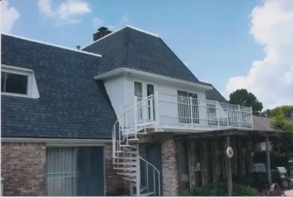 Completed shingle roof replacement on a Houston home